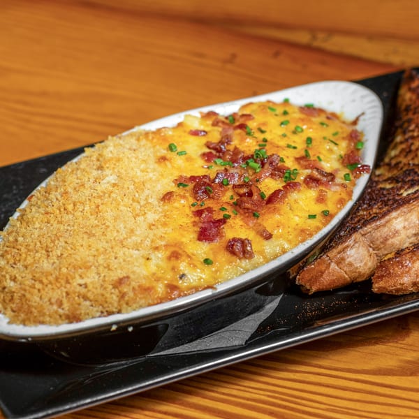 Dea's In & Out's baked mac and cheese with bacon and chives, served with toasted bread.